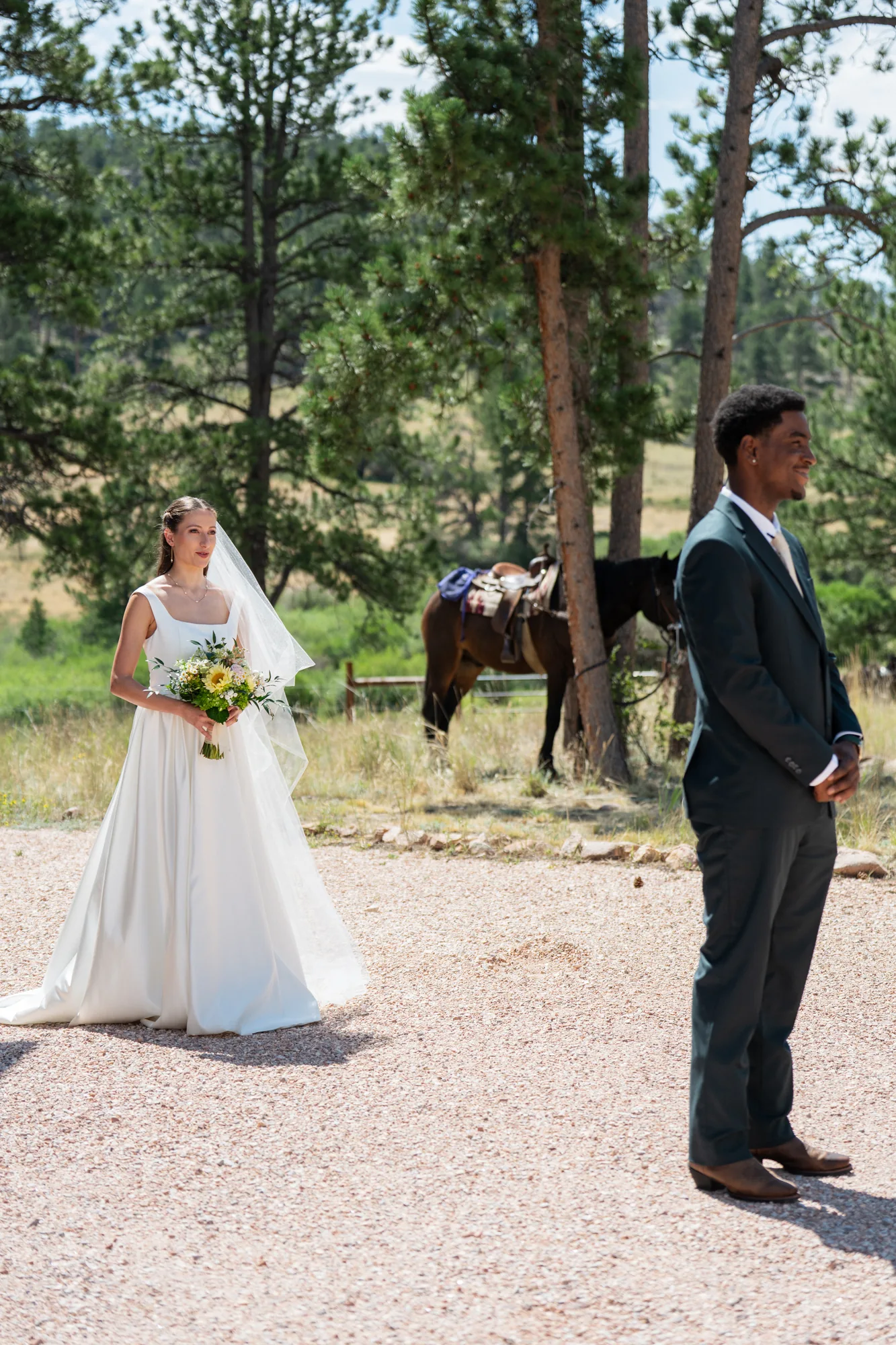 Isabella and Tim seeing one another before their horseback elopement at Sundance Trail Guest Ranch